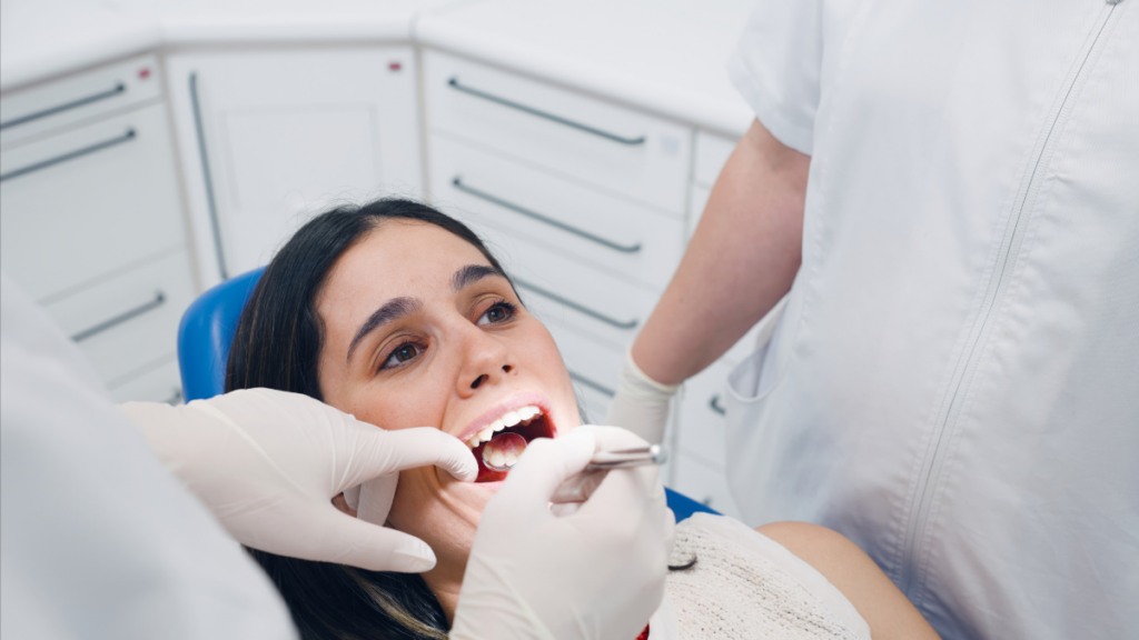 Patient receiving a dental exam at Broad St Smiles in San Luis Obispo, CA.