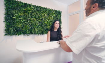 New patient welcomed by the front desk team at Broad St Smiles in San Luis Obispo, CA.